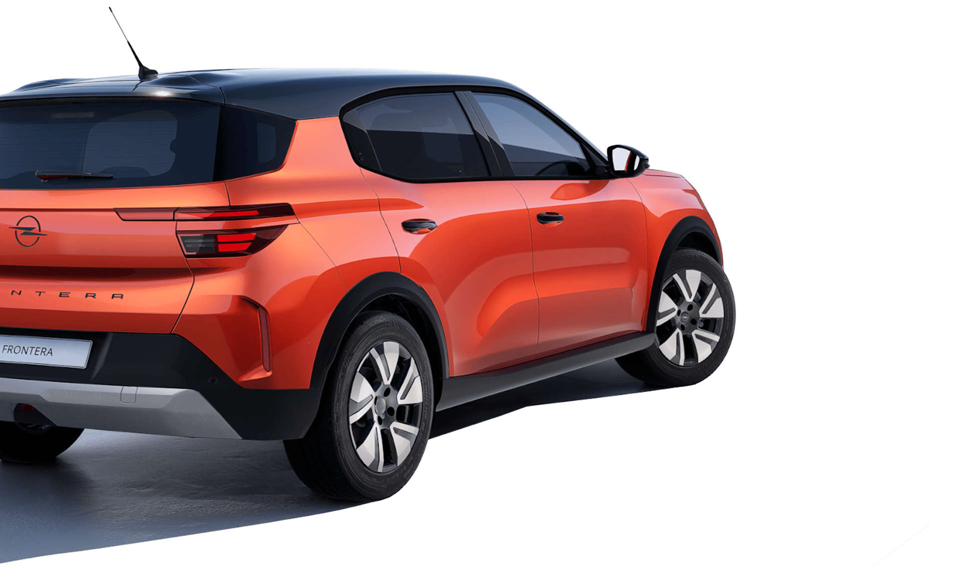 Новий Opel Frontera помаранчевого кольору, вигляд ззаду з правого боку